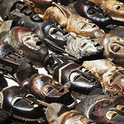Landing carved wooden african masks