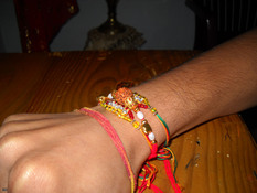 Landing rakhi tied to a man s wrist hindu festival celebrated in mauritius